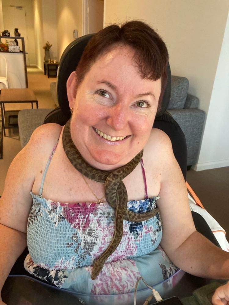 Melanie with a pet snake