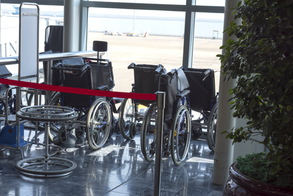 Empty wheelchair parked in airport